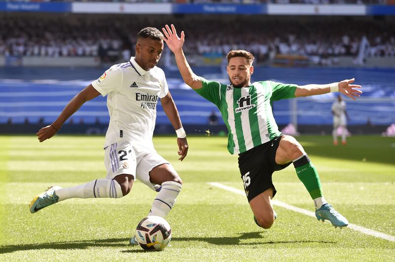 Rodrygo is tackled by Alex Moreno during the match between Real Madrid and Real Betis. Getty