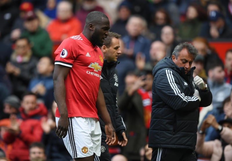 MANCHESTER, ENGLAND - APRIL 29: Romelu Lukaku of Manchester United is taken off injured during the Premier League match between Manchester United and Arsenal at Old Trafford on April 29, 2018 in Manchester, England.  (Photo by Shaun Botterill/Getty Images)