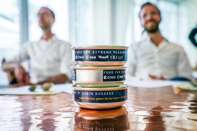 Tins of 'space food' are presented at the Orbite Astronaut Orientation course. Photo: Magali Maricot / Orbite