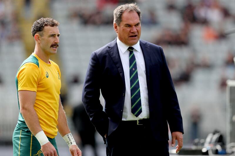 Australia's coach Dave Rennie talks to Nic White. AFP