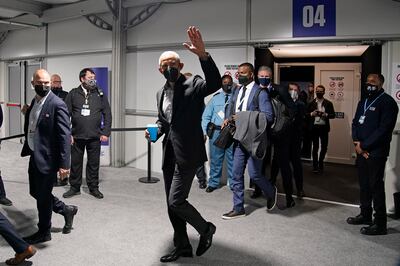 Crowds were waiting for Mr Obama as he walked through the conference venue in Glasgow. AP