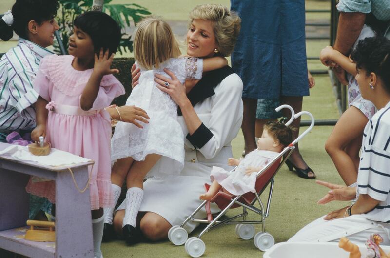 Diana, Princess of Wales  (1961 - 1997) at a Dr Barnardo's Home in Auburn, New South Wales, Australia, January 1988. She is wearing a dress by Catherine Walker.  (Photo by Jayne Fincher/Princess Diana Archive/Getty Images)