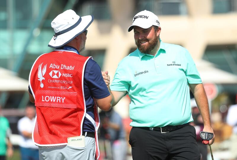 ABU DHABI, UNITED ARAB EMIRATES - JANUARY 16:  Shane Lowry of Ireland and caddie Brian "Bo" Martin react on the ninth green during Day One of the Abu Dhabi HSBC Golf Championship at Abu Dhabi Golf Club on January 16, 2019 in Abu Dhabi, United Arab Emirates. (Photo by Warren Little/Getty Images)