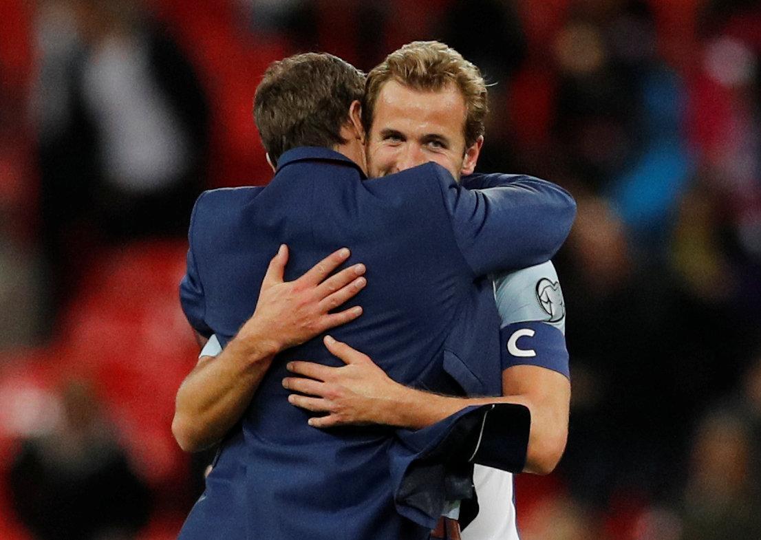 Harry Kane celebrate after the match with England manager Gareth Southgate. Darren Staples / Reuters