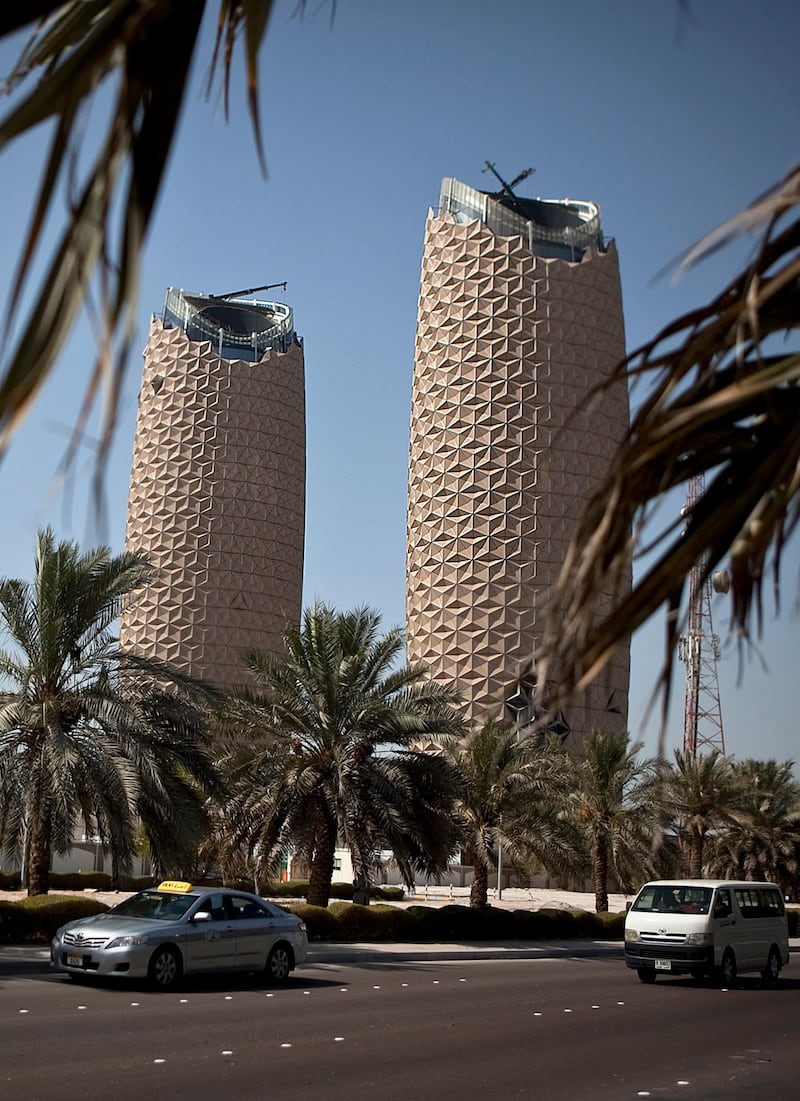 Abu Dhabi, United Arab Emirates, June 12, 2012:   
The Al Bahr Towers in Abu Dhabi use a solar shading system that features a computer-controlled facade made up of thousands of translucent units.  Umbrellas connected to motors open and shut depending on where the sunlight is create an eco friendly building. The towers, on the corner of Saada and Salam Streets in Abu Dhabi will house the offices for the Abu Dhabi Investment Council.  (Silvia Razgova / The National)


     (Note: spelling for the Bahr towers has officially been changed to Bahar - June 12, 2012) *** Local Caption ***  test2.jpg