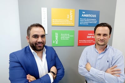 Dubai, United Arab Emirates - July 16, 2019: FlexxPay is a way for employees to access part of their salary in between pay cheques. The online platform was co-founded by Dubai entrepreneurs Michael Truschler (R) and Charbel Nasr. Tuesday the 16th of July 2019. Dubai Mall, Dubai. Chris Whiteoak / The National
