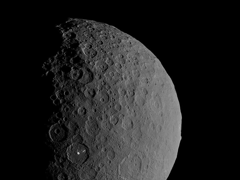 Occator Crater and Ahuna Mons appear together in this view of the dwarf planet Ceres obtained by NASA's Dawn spacecraft on February 11, 2017. NASA/JPL-Caltech/UCLA/MPS/DLR/IDA/Handout via REUTERS.  THIS IMAGE HAS BEEN SUPPLIED BY A THIRD PARTY.