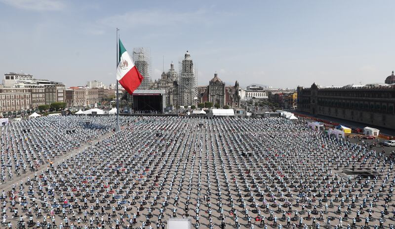 People attend a mass trampoline class in Mexico City, Mexico, 23 October 2022.  The ZÃ³calo of the Mexican capital was the setting where the Guinness Record was set for 'The World's Largest Fitness Trampoline Class', when 3,935 participants gathered.  After participating during the 30-minute class, the Head of Government of Mexico City, Claudia Sheinbaum stressed that the new Guinness Record shows that Mexico City is the most sporty in the world.   EPA / Mario GuzmÃ¡n