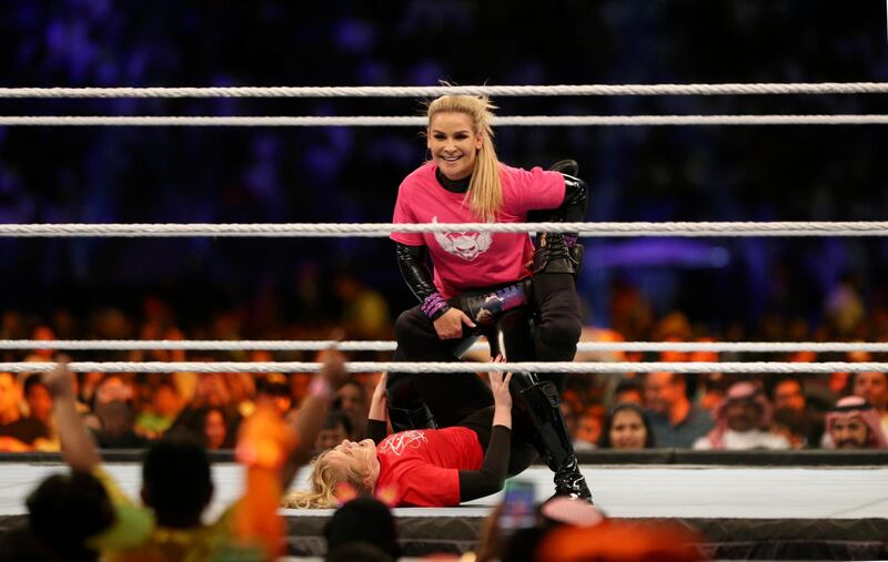 Natalya takes down Evans. AP Photo