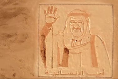 A sand portrait of Kuwaiti emir Sheikh Sabah Al Ahmed is etched into the desert in Dubai to mark the country's National Day and Liberation Day this week. Courtesy Sheikh Mohammed bin Rashid Twitter