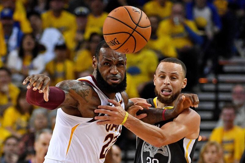 June 3, 2018; Oakland, CA, USA; Golden State Warriors guard Stephen Curry (30) and Cleveland Cavaliers forward LeBron James (23) go for a loose ball during the second quarter in game one of the 2018 NBA Finals at Oracle Arena. Mandatory Credit: Kyle Terada-USA TODAY Sports     TPX IMAGES OF THE DAY