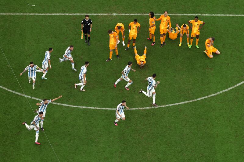 Argentina players celebrate after their win in the penalty shoot-out. Getty