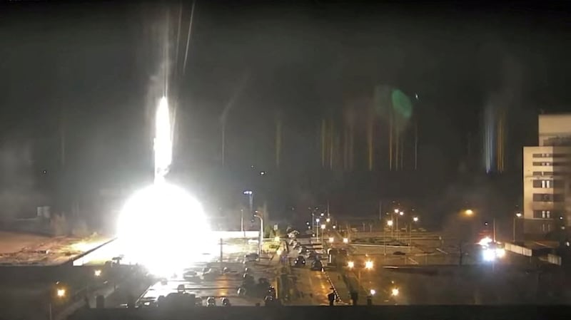 Surveillance camera footage shows a flare landing at the Zaporizhzhia nuclear power plant. Reuters