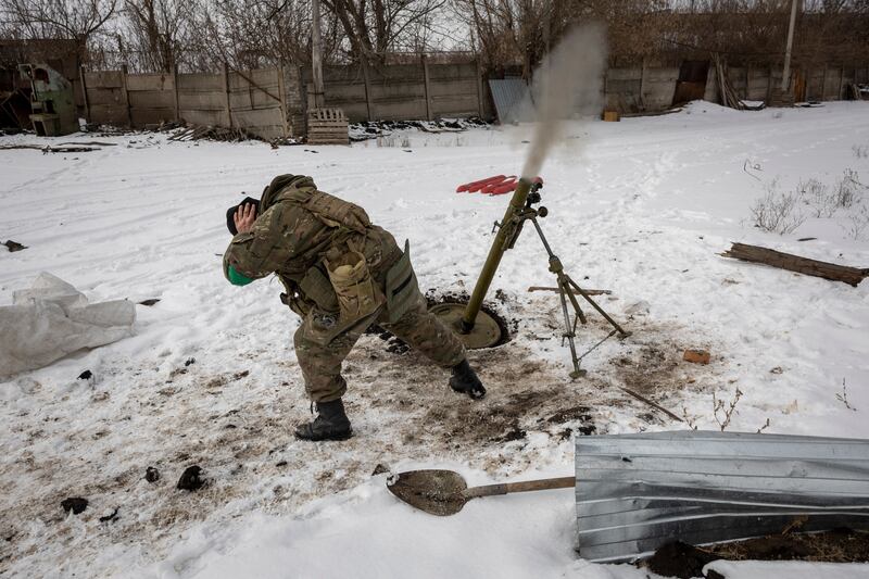 A Ukrainian mortar team fires on a Russian position in Bakhmut, Ukraine. Getty
