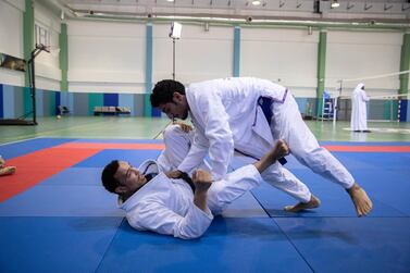 Faisal Al Ketbi, bottom, is one of the UAE national team's leading jiu-jitsustars. Courtesy Action Group