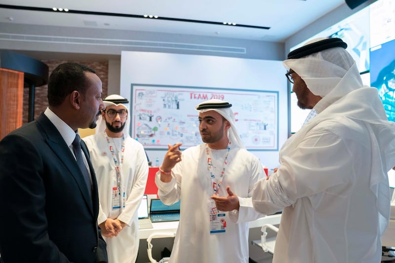ABU DHABI, UNITED ARAB EMIRATES - March 18, 2019: HH Sheikh Mohamed bin Zayed Al Nahyan, Crown Prince of Abu Dhabi and Deputy Supreme Commander of the UAE Armed Forces (R) and HE Abiy Ahmed, Prime Minister of Ethiopia (L), tour the Special Olympics World Games Abu Dhabi 2019, at Abu Dhabi National Exhibition Centre (ADNEC).

( Ryan Carter / Ministry of Presidential Affairs )?
---