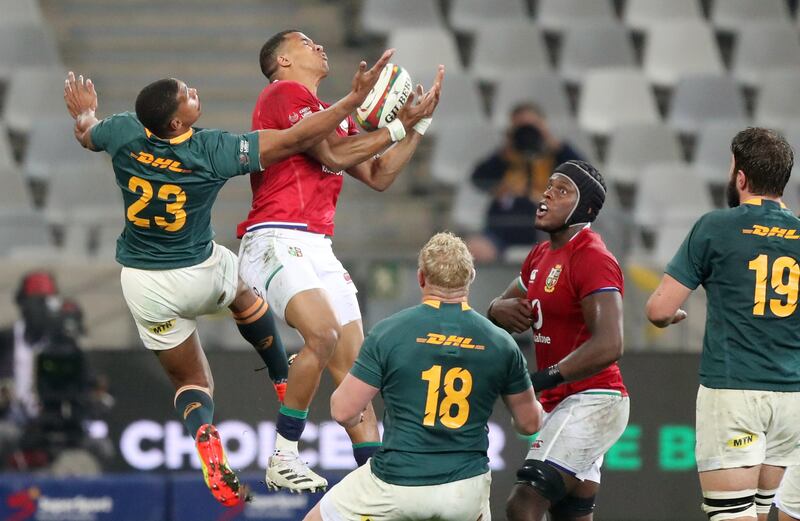 British & Irish Lions' wingbAnthony Watson in action with South Africa's Damian Willemse.