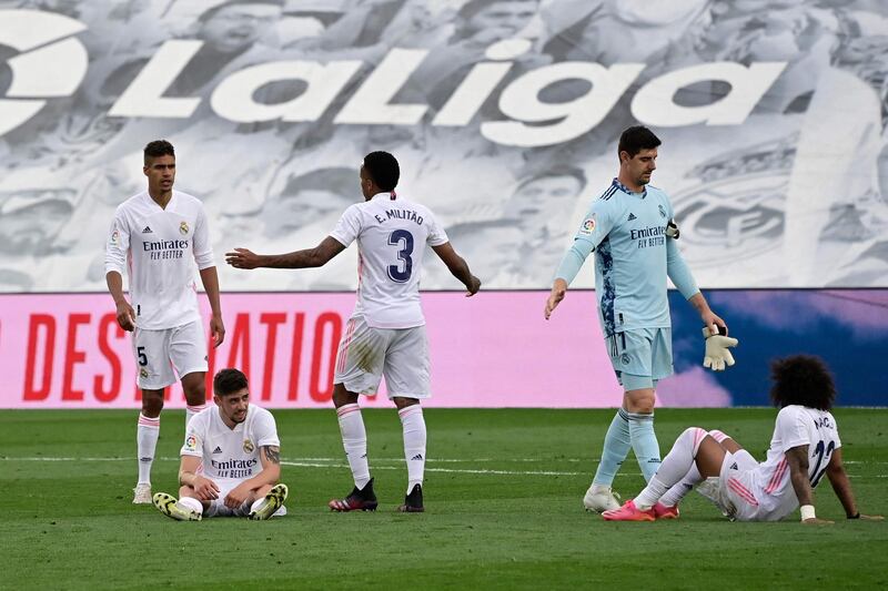 Dejected Real players after the match. AFP