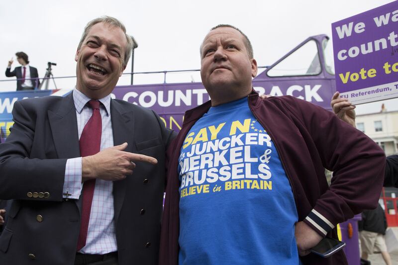 UKIP leader Nigel Farage, who played a decisive role in the No Vote, is pictured with a supporter in Kent, England, in June. Just over 52 per cent of the UK population, overwhelmingly in England, voted to leave the EU. Dan Kitwood / Getty Images