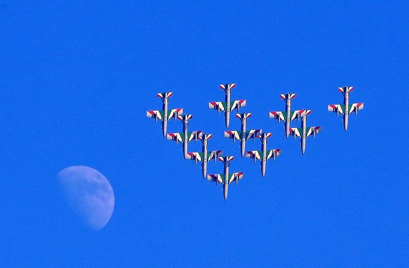 Italian Air Force aerobatic team performs in Kuwait City. AFP