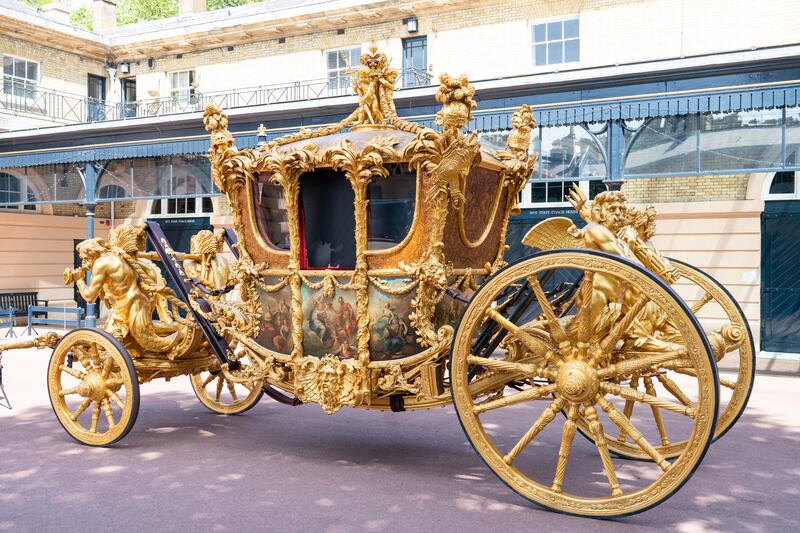 The gold state coach  stands in the Royal Mews at Buckingham Palace. The coach will be used as part of the jubilee celebrations. Getty Images
