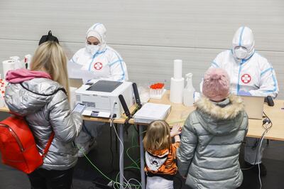 Ukrainian refugees are tested for coronavirus in a reception centre in Vienna, Austria, on March 4, 2022. AFP