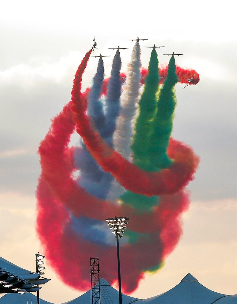 The Al Fursan UAE Aerobatic Team performs prior to the start of the Abu Dhabi Grand Prix. Valdrin Xhemaj / EPA