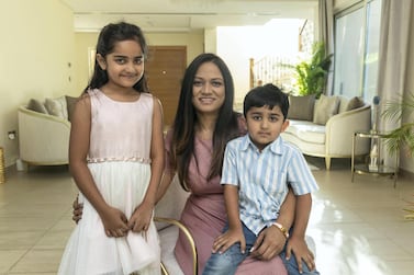 Shruti Sayed with her daughter Sara and son Ryan. She counts on Facebook groups such as Shop Well for Less and Dirham Stretcher for discount codes, which help her keep a lid on expenses. Photo: Antonie Robertson / The National