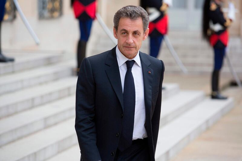 (FILES) In this file photo taken on June 25, 2016 Former French president and head of the right-wing opposition party "Les Republicains" (The Republicans) Nicolas Sarkozy leaves after a meeting with French President who meets French leaders of political parties and movements at the Elysee presidential Palace in Paris, after Britain voted to leave the European Union a day before.
Former French president Nicolas Sarkozy has been ordered to stand trial for corruption and influence peddling involving a judge, from whom he tried to get information about an investigation, a legal source said on March 29, 2018. / AFP PHOTO / GEOFFROY VAN DER HASSELT