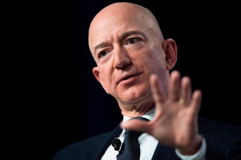 (FILES) In this file photo taken on September 19, 2018 Amazon and Blue Origin founder Jeff Bezos provides the keynote address at the Air Force Association's Annual Air, Space & Cyber Conference in Oxen Hill, Maryland. Jeff Bezos remains the world's richest person, ahead of Bill Gates and Warren Buffett, according to the latest Forbes list of the ultra wealthy. But while things are largely stable up top in that ranking, Facebook founder Mark Zuckerberg dropped three spots and former New York mayor Michael Bloomberg rose by two. According to the list announced March 4, 2019 by Forbes, the riches of Bezos, 55, have swelled by $19 billion in one year and he is now worth $131 billion.
 / AFP / Jim WATSON
