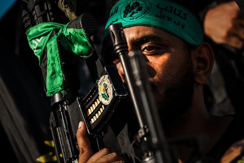 Fighters wearing Hamas paraphernalia pictured near the occupied West Bank city of Tulkarem on October 20. A recent opinion poll shows that support for the group has more than tripled in the West Bank since the conflict began. LA Times