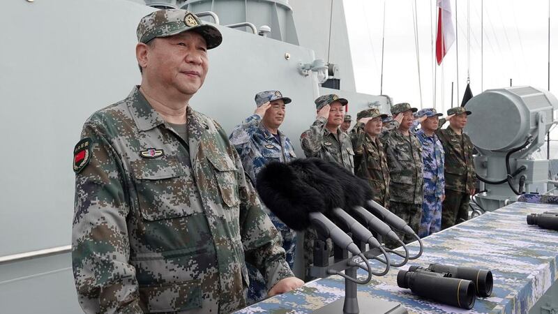 Chinese President Xi Jinping reviewing the Chinese People's Liberation Army Navy fleet in the South China Sea. Li Gang / Xinhua / AP