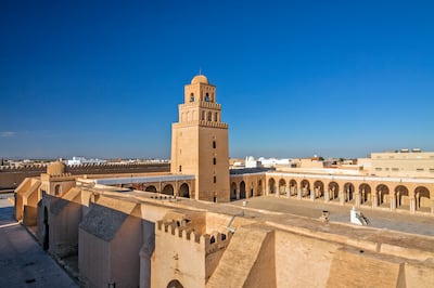 Growing up listening to tales of Kairouan's glorious past instilled in Latta an abiding love for Kairouan, above, with its Great Mosque and 9th-century minaret