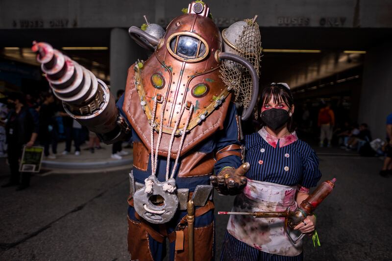 Cosplayers dressed as characters from the 'BioShock' video game during the New York Comic Con. Charles Sykes / Invision / AP