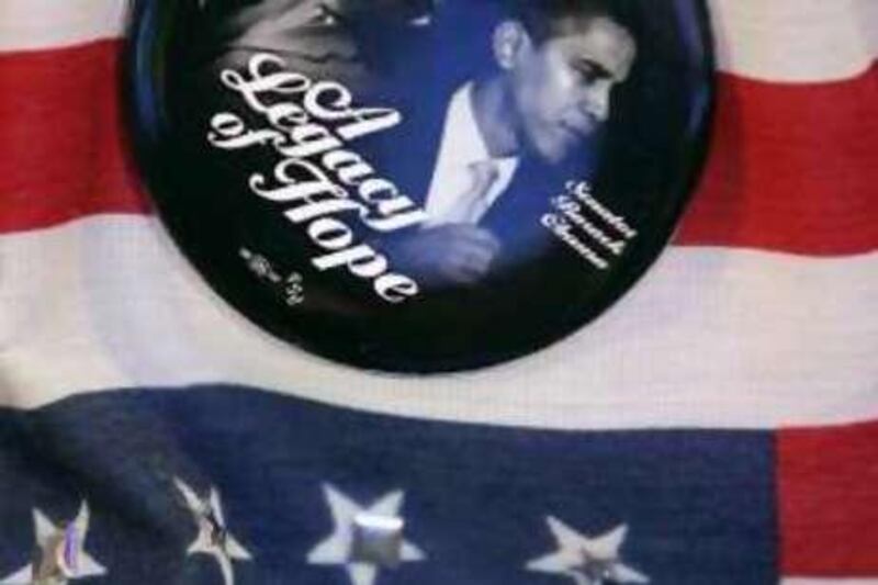 Preston Marshall Jr., a delegate from Miami, wears a button bearing photos of both the late Dr. Martin Luther King Jr., and Democratic presidential candidate, Sen. Barack Obama, D-Ill., during the Democratic National Convention in Denver, Wednesday, Aug. 27, 2008.  (AP Photo/Jae C. Hong)