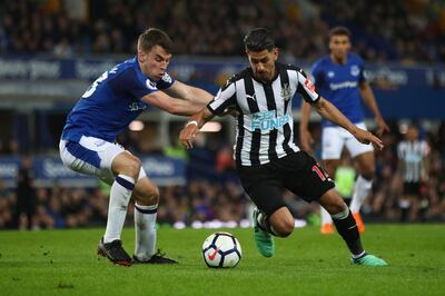 LIVERPOOL, ENGLAND - APRIL 23:  Seamus Coleman of Everton and Ayoze Perez of Newcastle United battle for possession during the Premier League match between Everton and Newcastle United at Goodison Park on April 23, 2018 in Liverpool, England.  (Photo by Clive Brunskill/Getty Images)