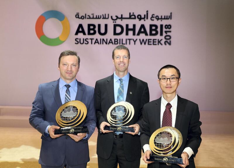 Abu Dhabi, United Arab Emirates - January 17th, 2018: L-R Dr Ali Abshaev, Prof Eric Frew and Dr Lulin Xue with their awards at the UAE rain research enhancement awards. Wednesday, January 17th, 2018 at Abu Dhabi National Exhibition Centre (ADNEC), Abu Dhabi. Chris Whiteoak / The National