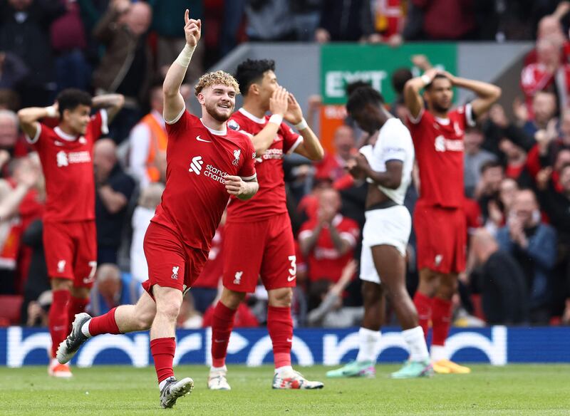 Liverpool's Harvey Elliott celebrates scoring the team's fourth goal. AFP