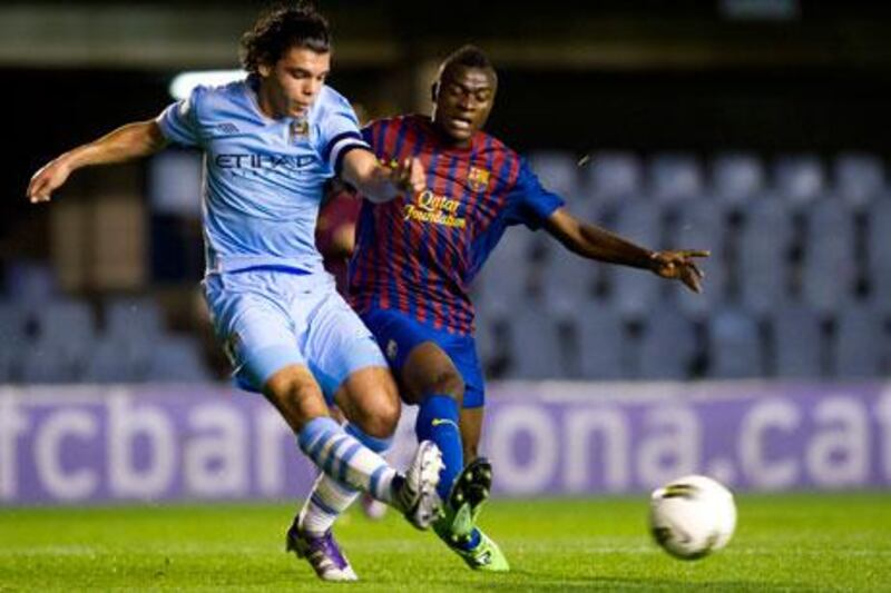 Karim Rekik, left, and his Manchester City B teammates can only benefit getting to play Vivaldi Bakoyoc and Barcelona B in competitions.