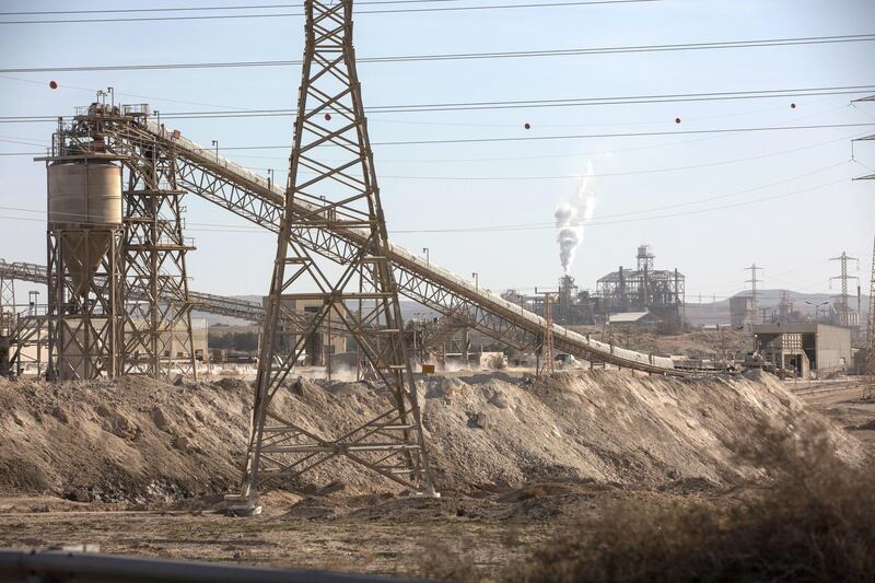 Israel Chemicals subsidiary Rotem Amfert is seen in the far background. The company is planning a new giant phosphate mine near the Negev Desert city of Arad in an area populated by thousands of Bedouins who lived in the area for generations.The plan has already been approved by a committee of ministers despite the warning that it could cause serious health issues and is scheduled to be  discussed in Israel's Knesset .
(Photo by Heidi Levine for The National).