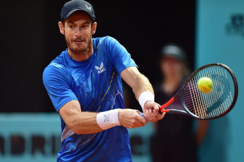 Andy Murray plays a double-handed backhand. Getty