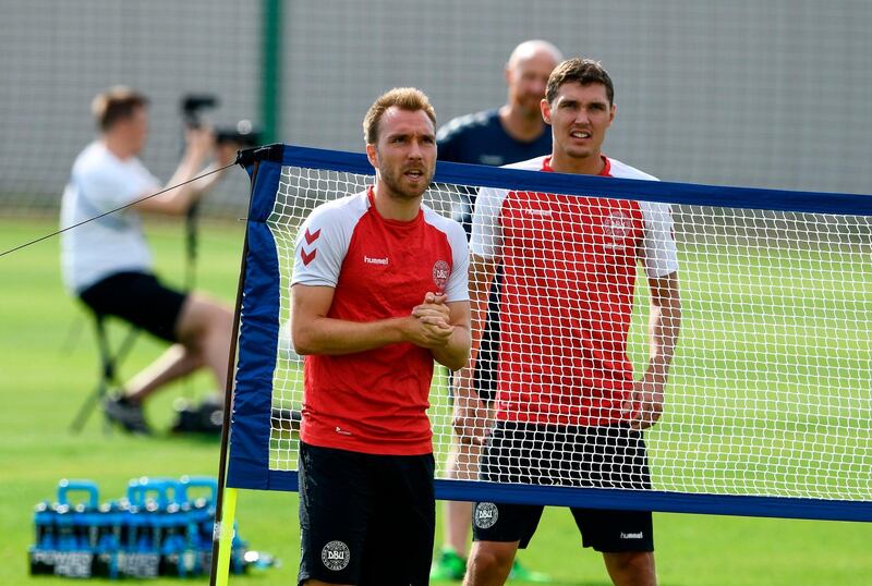 Denmark's midfielder Christian Eriksen (L) and defender Andreas Christensen attend a training session on June 18, 2018, in Vityazevo during the Russia 2018 World Cup football tournament.  / AFP / Jonathan NACKSTRAND
