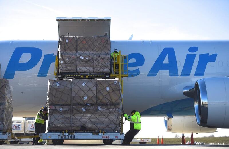 An Amazon plane at Lehigh Valley international airport near New York. Flying to such remote locations helps it save time. Mark Makela / Reuters