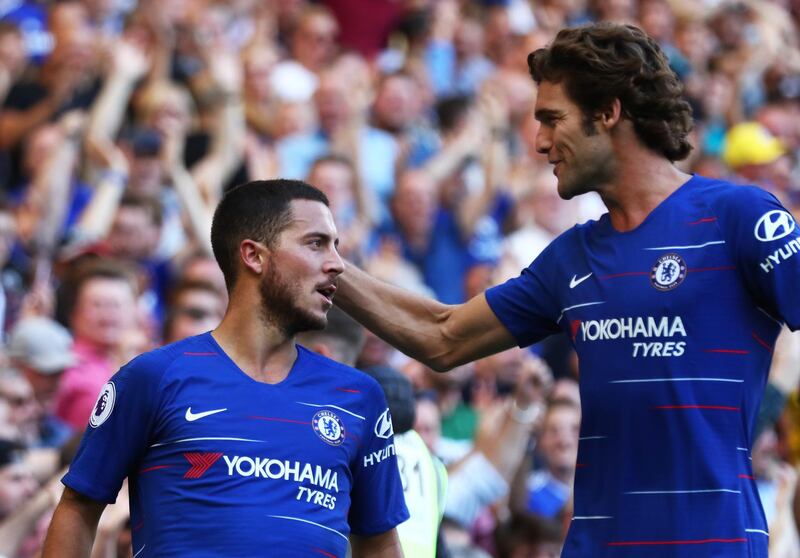 LONDON, ENGLAND - SEPTEMBER 01:  Eden Hazard of Chelsea celebrates with teammate Marcos Alonso after scoring his team's second goal during the Premier League match between Chelsea FC and AFC Bournemouth at Stamford Bridge on September 1, 2018 in London, United Kingdom.  (Photo by Clive Rose/Getty Images)