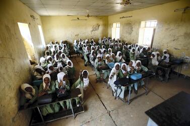 The UK is reducing overseas aid from 0.7 per cent of national income to 0.5 per cent with girls' education expected to be adversely affected. AFP