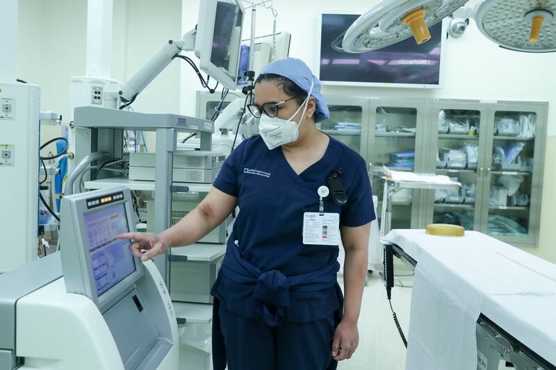 A nurse operates the Hipec equipment, used for heated chemotherapy for abdnominal cancers. Khushnum Bhandari/ The National