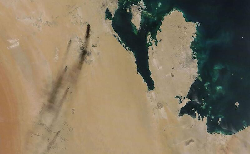 A satellite image provided by NASA Worldview shows fires following drone strikes on two major oil installation owned by the state giant Aramco, in eastern Saudi Arabia, and claimed by the Tehran-backed Huthi rebels in neighbouring Yemen, where a Saudi-led coalition is bogged down in a five-year war. Saudi Arabia raced on September 15, 2019 to restart operations at oil plants hit by drone attacks which slashed its production by half, as Iran dismissed US claims it was behind the assault. The peninsula in the image is Qatar and the island (top) is Bahrain.  AFP PHOTO / NASA Worldview