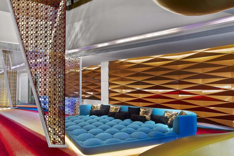 Above, the lounge and hotel lobby of the W Dubai – Al Habtoor City, which opened last week. Courtesy Al Habtoor Group
