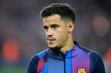 (FILES) In this file photo taken on December 18, 2021 Barcelona's Brazilian midfielder Philippe Coutinho warms up before the Spanish league football match between FC Barcelona and Elche CF at the Camp Nou stadium in Barcelona.  - Philippe Coutinho joins Aston Villa on loan from Barcelona, Premier League club announced on January 7, 2022.  (Photo by Pau BARRENA  /  AFP)