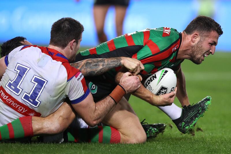 Sam Burgess of the Rabbitohs is tackled and drops the ball over the try-line at ANZ Stadium in Sydney, Australia. Getty Images